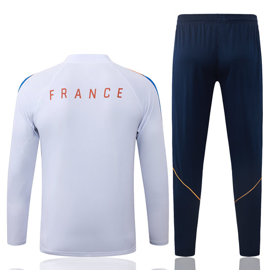 back view of the Nike France 2026/27 White/Navy Quarter-Zip Soccer Tracksuit - Dri-FIT Strike Set