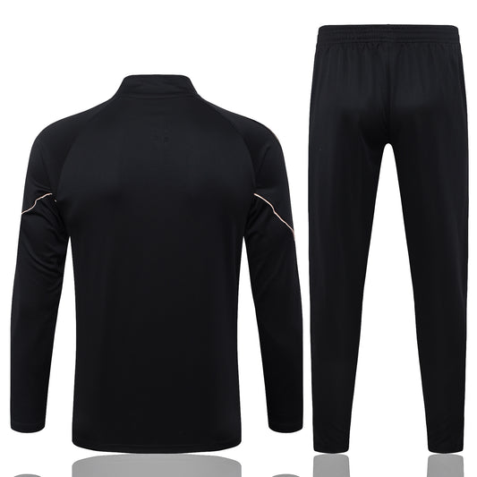 back view of the Puma Portugal 2026/27 Full Black Quarter-Zip Soccer Tracksuit - Training Set