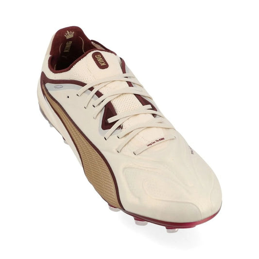 front view of the PUMA King 20 Ultimate FG/AG Launch Edition in Almond/Aubergine/Gold colorway