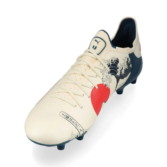front view of the PUMA X Unisport King Ultimate FG/AG Great Wave in Almond/Red/Ocean colorway