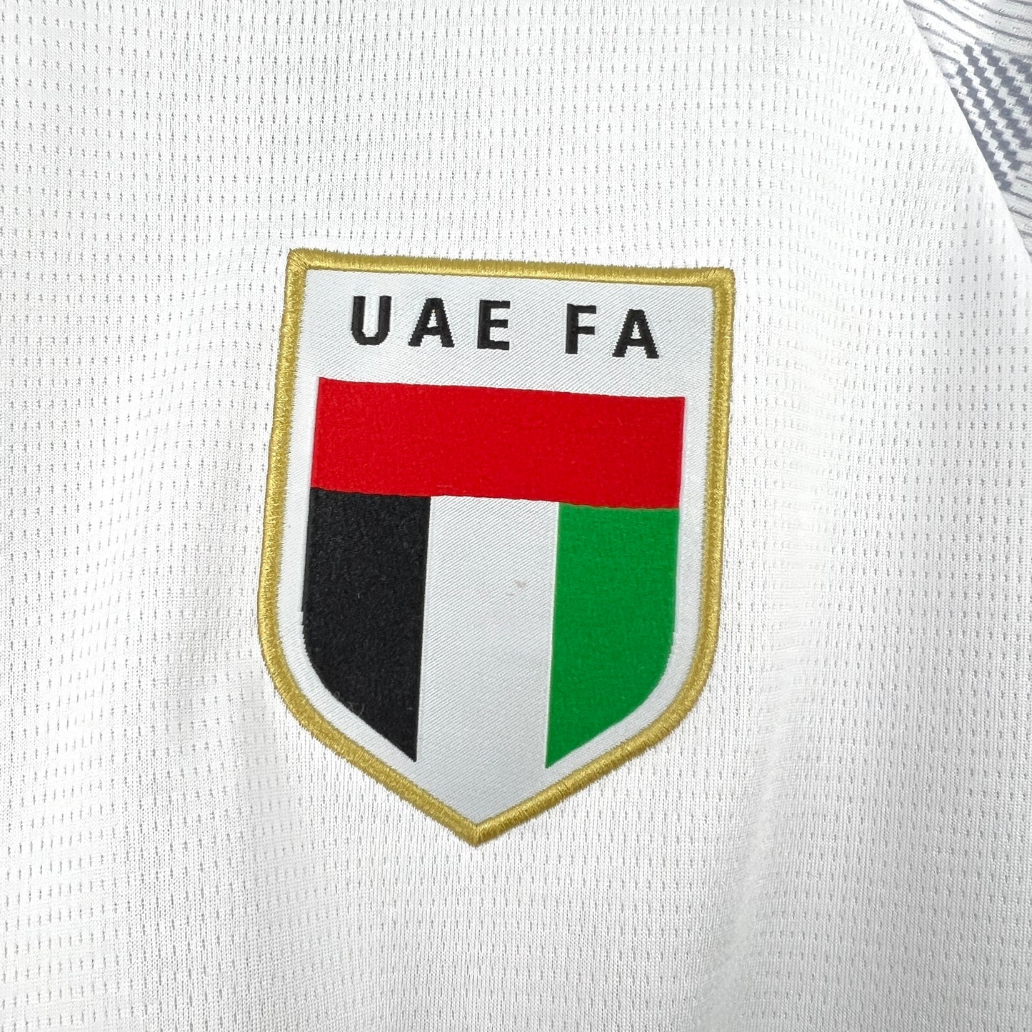UAE FA logo on the Adidas UAE 2026 World Cup Home White Jersey.