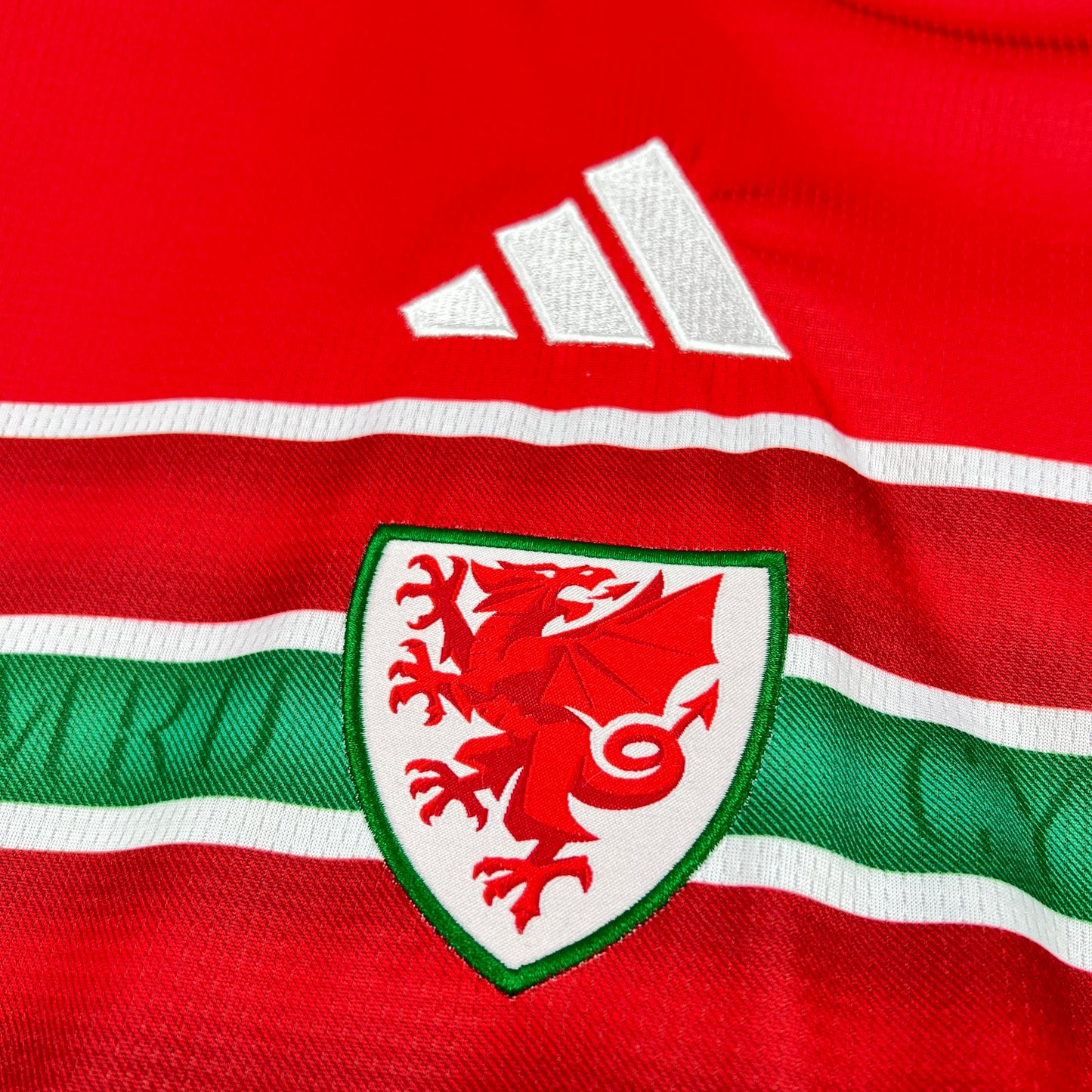 close up logo on the Adidas Wales 2026 World Cup Home Jersey