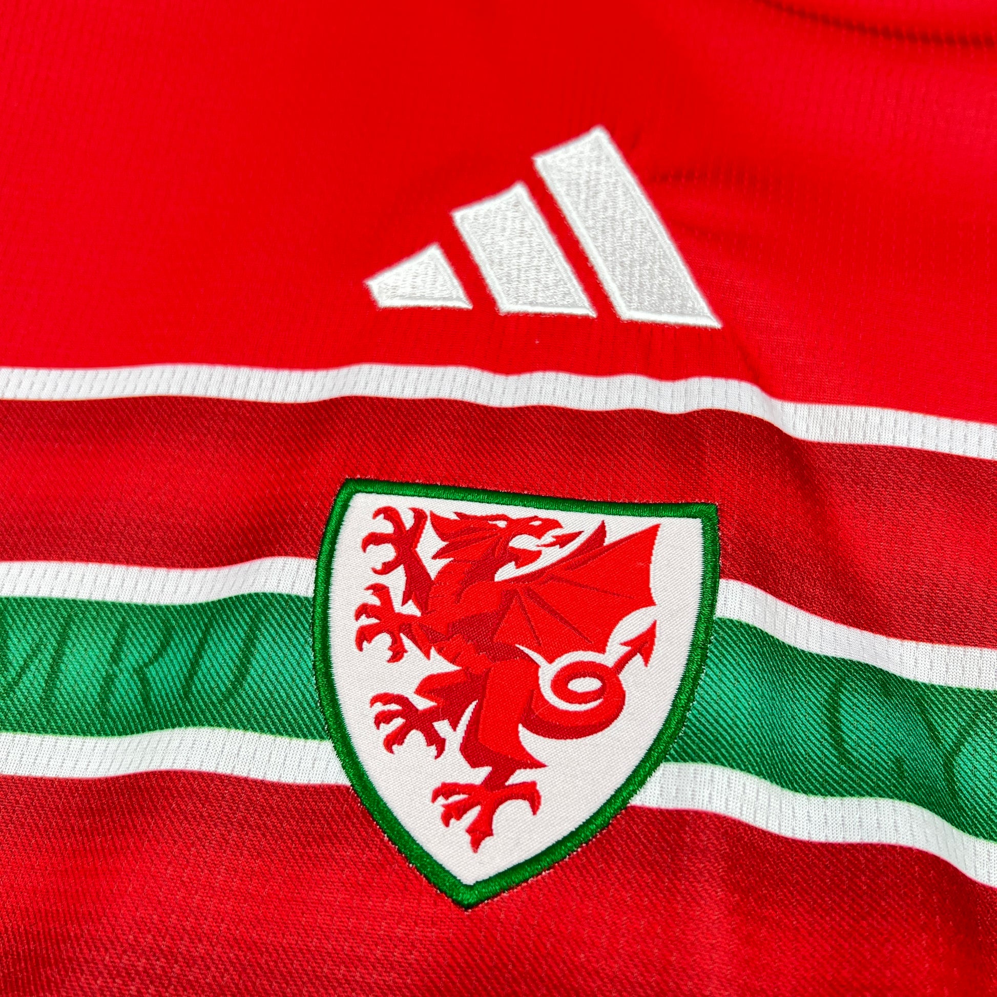 close up logo on the Adidas Wales 2026 World Cup Home Jersey
