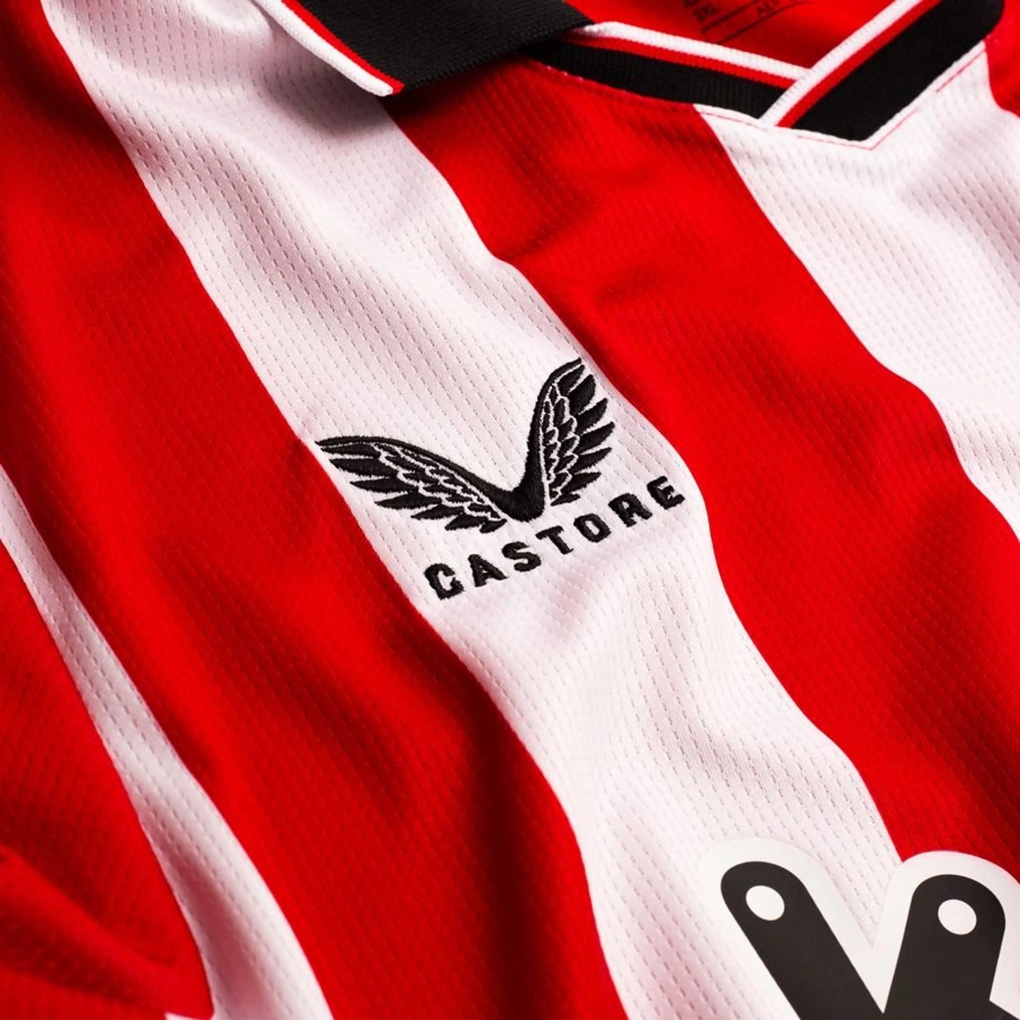 Castore logo view on the Athletic Bilbao 2025/26 Home Red & White Shirt