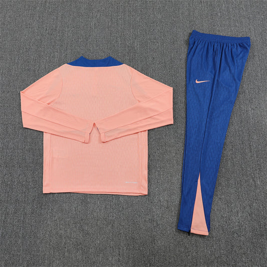 Back view of the France 25/26 Quarter-Zip Tracksuit Pink & Blue.