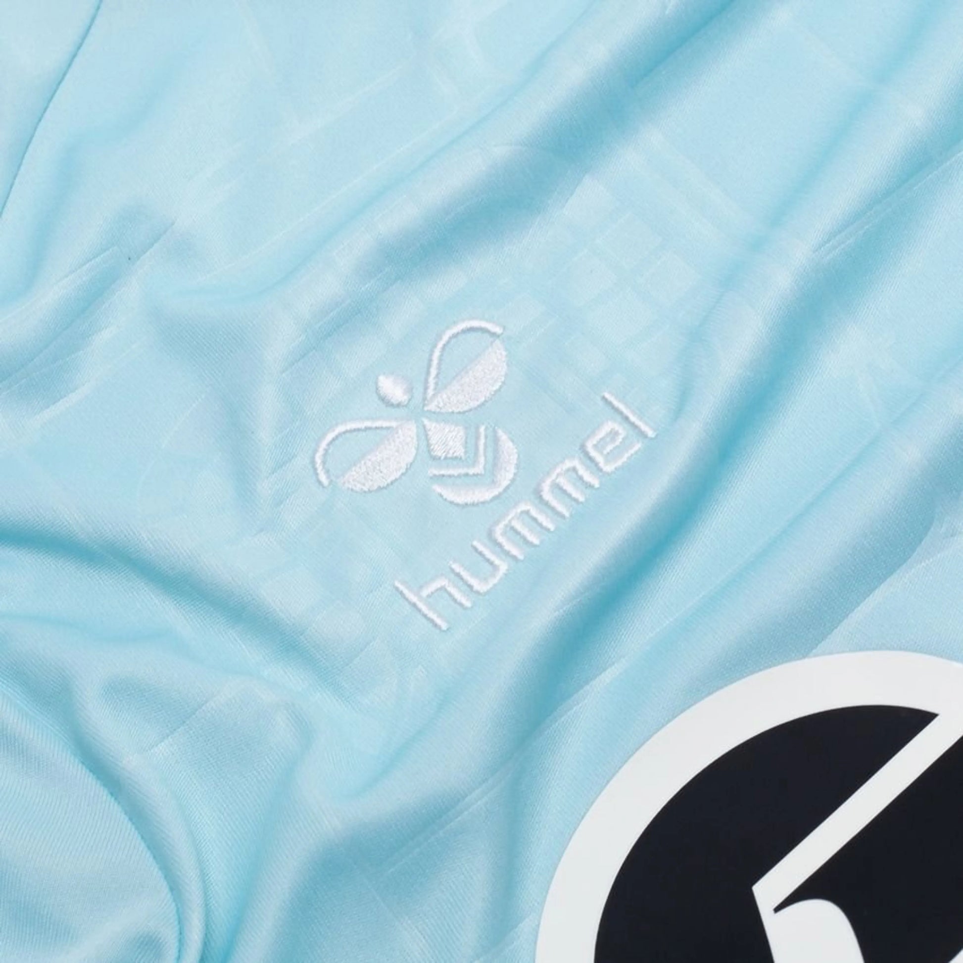 Hummel logo view on the Real Betis 2025/26 Away Shirt