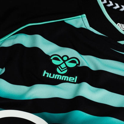 Hummel logo view on the Real Betis 2025/26 Third Black Shirt