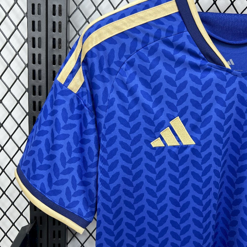 side view of the Italy 2026 Worldcup Home Blue sports jersey with yellow accents and Adidas logo.