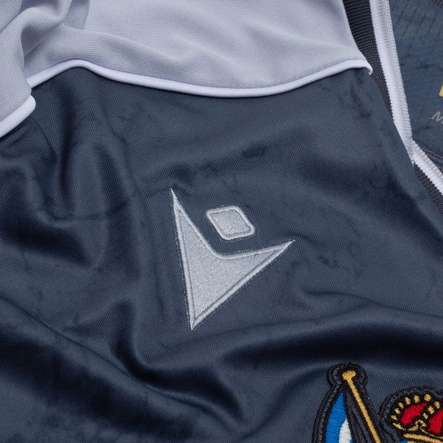 Macron logo view on the Real Sociedad Away Shirt 2025/26