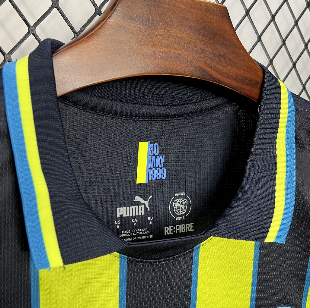 neck view of the Manchester City 2024/2025 Away Puma Black & Yellow Jersey