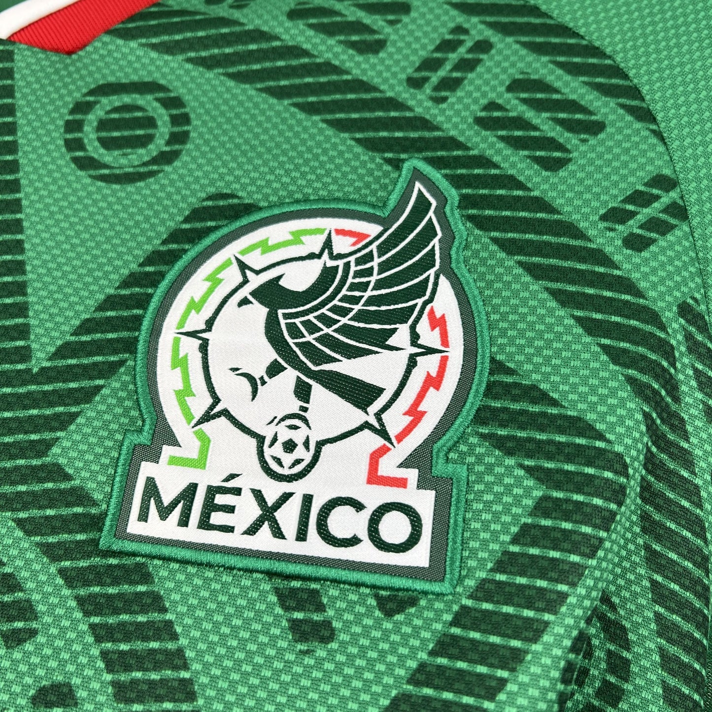 Close up view of Mexico's team logo on their 2026 worldcup home green jersey.