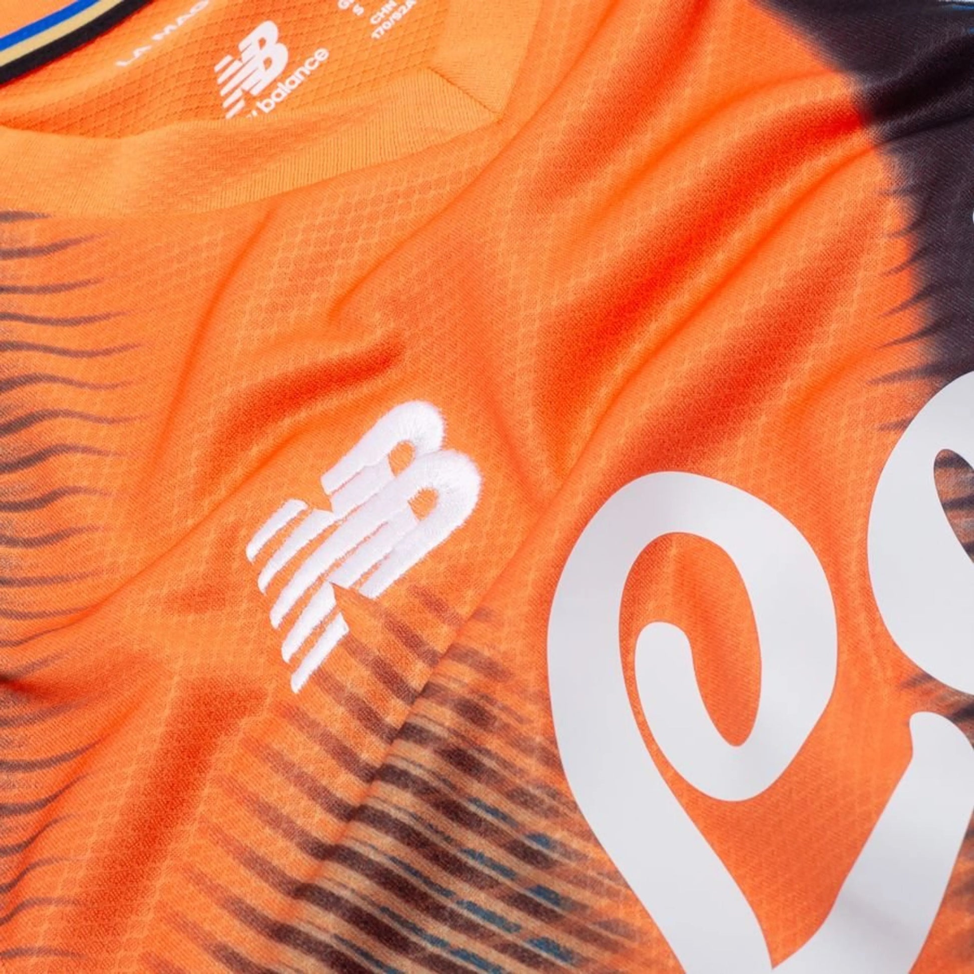 New Balance logo view on the Atalanta BC 2025/26 Third Shirt