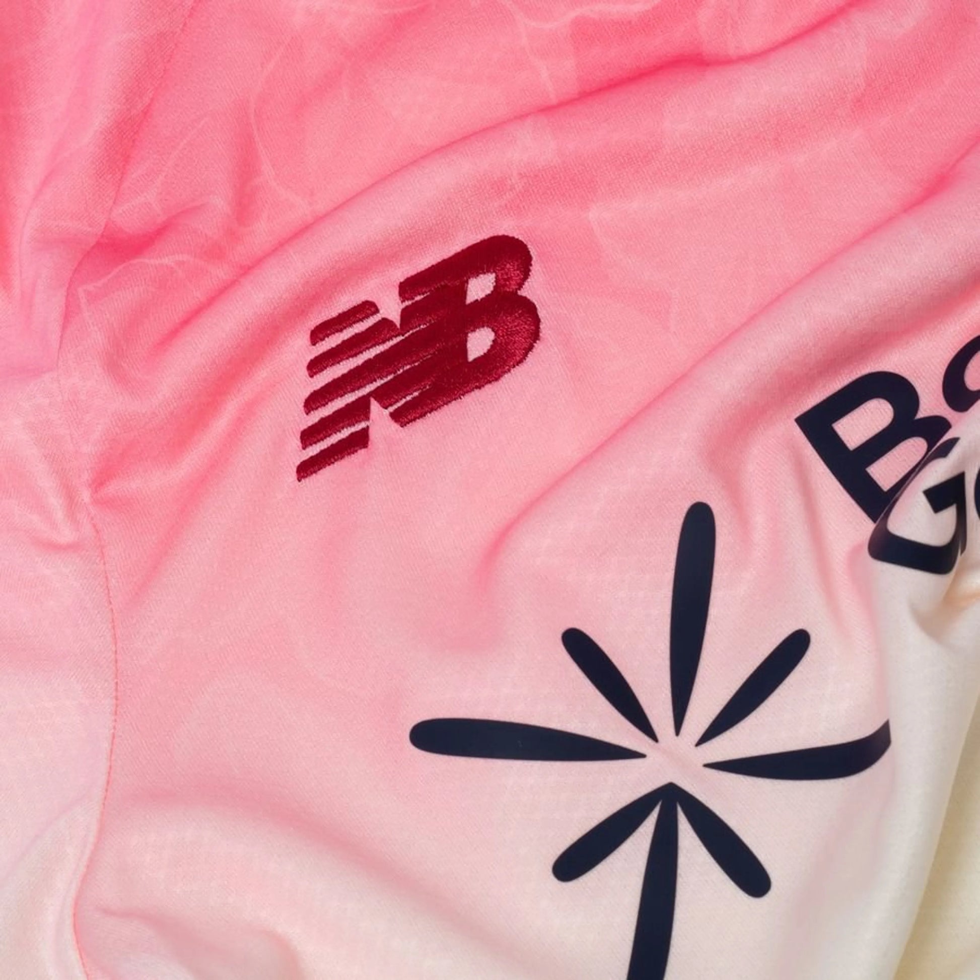 New Balance logo view on the Bayer Leverkusen 2025/26 Away White Shirt