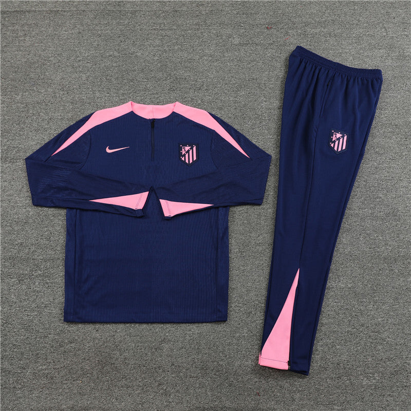Front view of the Nike Atletico Madrid 24/25 Navy Quarter Zip Tracksuit.