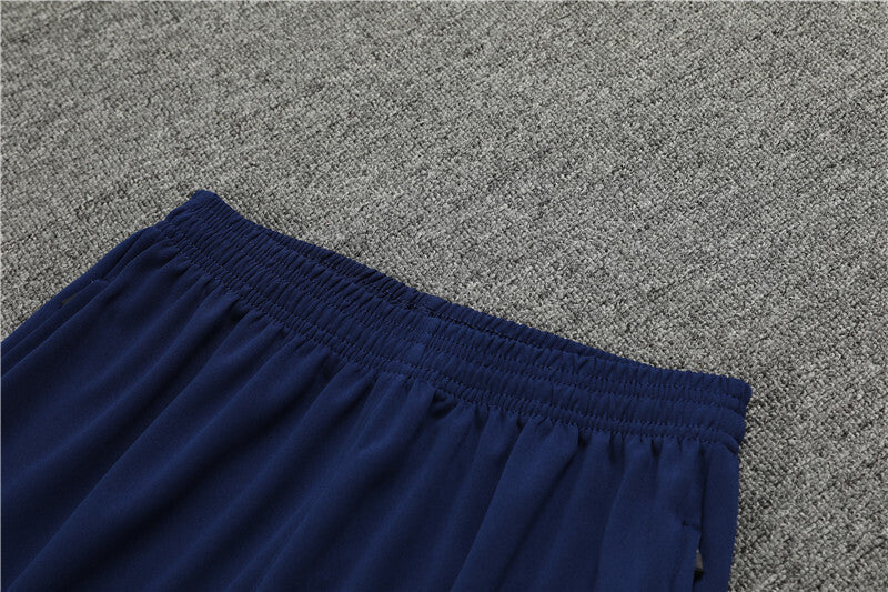 close view of the pants of the Nike Atletico Madrid 24/25 Navy Quarter Zip Tracksuit.