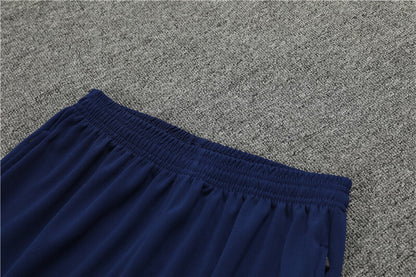 close view of the pants of the Nike Atletico Madrid 24/25 Navy Quarter Zip Tracksuit.