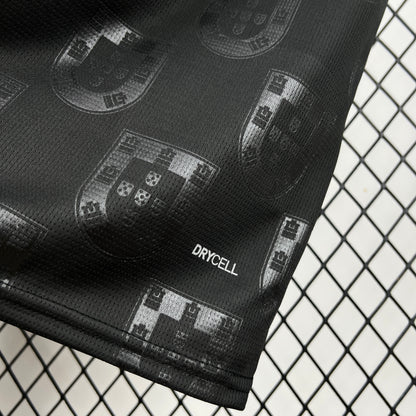 Portugal 2026 Away Black Jersey - close view on the bottom right showing "Drycell" crest.