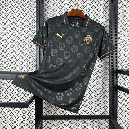 Portugal 2026 Away sports jersey with pattern and portugal/puma brand logo on a hanger against a grid background.