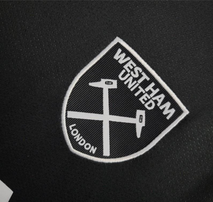 close view of the logo on the West Ham United 2024/2025 Away Black Jersey