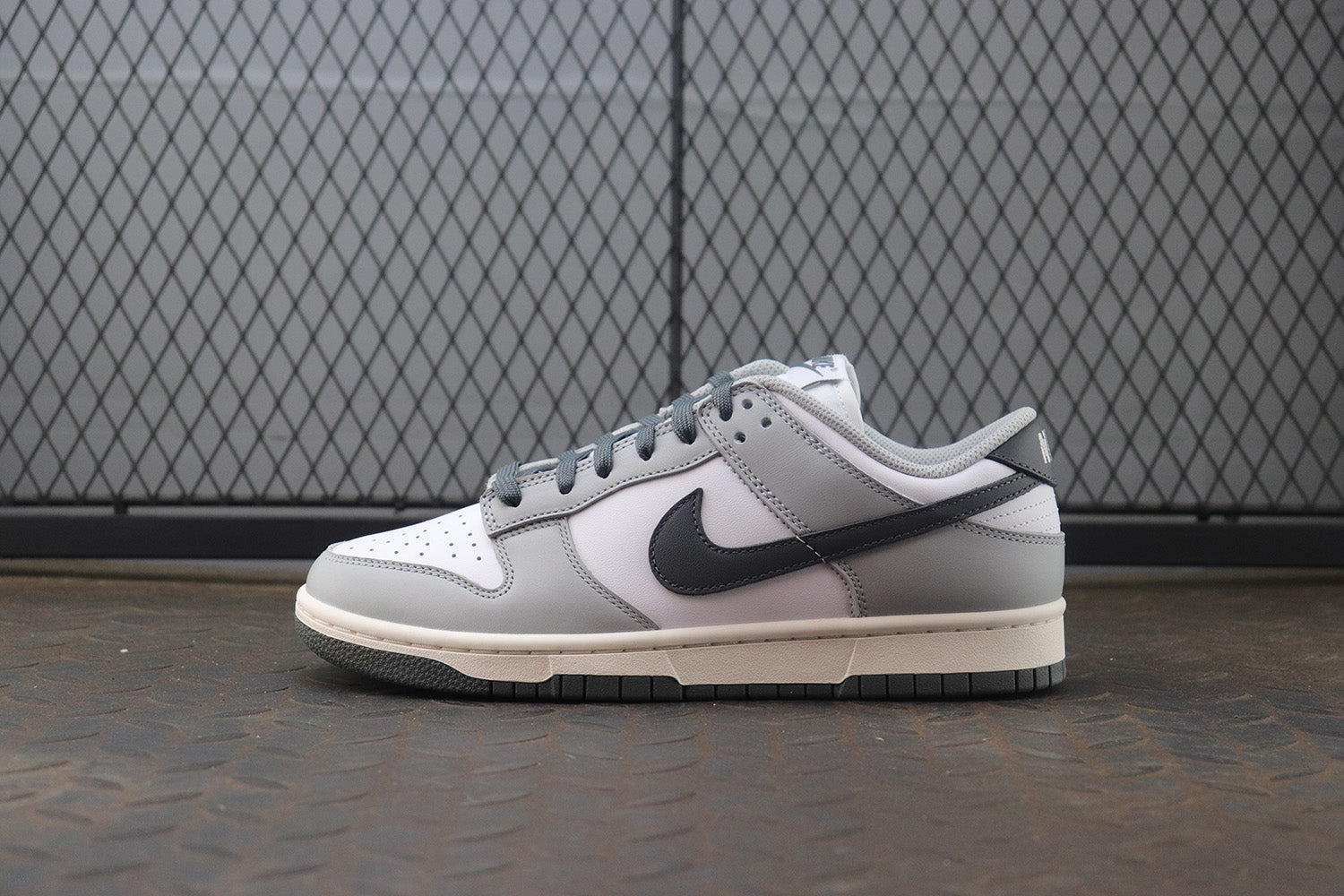 Nike dunk low light smoke grey, all sizes available.