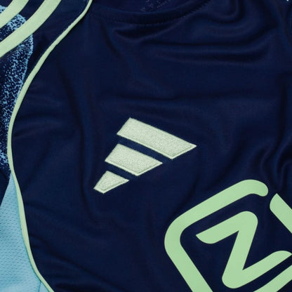 adidas logo view on the Ajax 2025/26 Away Blue Shirt