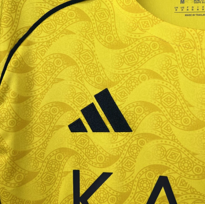 adidas logo view of the Al-Nassr 25/26 Home Yellow Football Short Sleeve Jersey Designed By Adidas