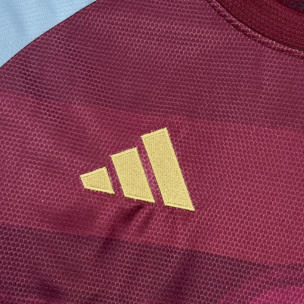 adidas logo view on the Aston Villa 2025/26 Home Red Jersey