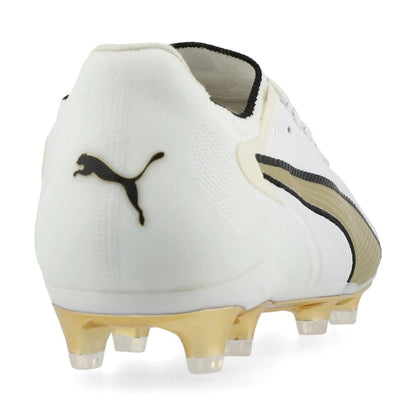 back heel view of the PUMA King 20 Ultimate FG/AG White Gold in White/Gold/Black colorway