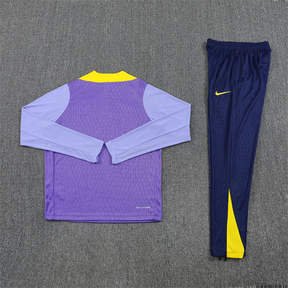 back view of the Atletico Madrid 25/26 Quarter-Zip Tracksuit Purple/Pink/Navy colorway