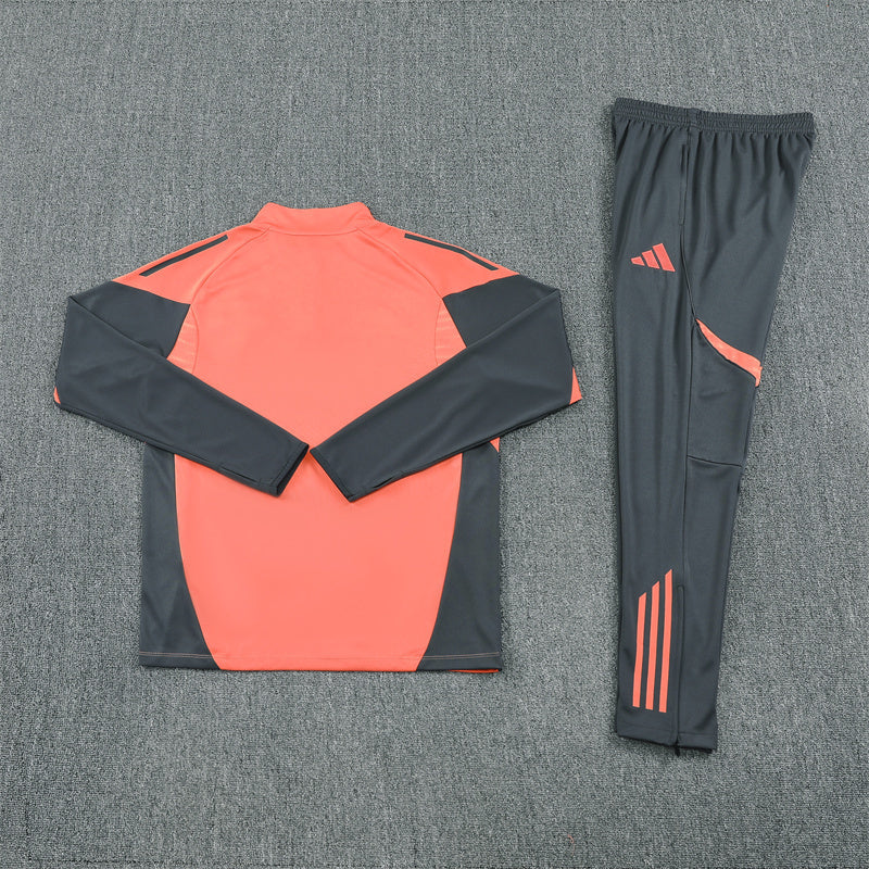 back view of the Bayern Munich 25/26 Quarter-Zip Tracksuit Orange top and grey pants