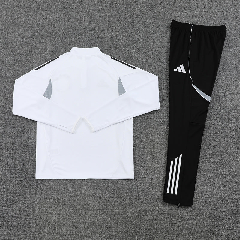 back view of the Germany 25/26 Quarter-Zip Tracksuit with white top and black pants