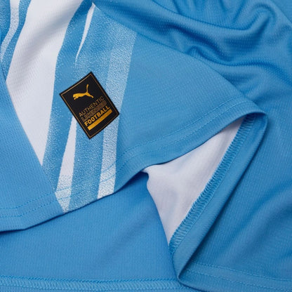 bottom left of the PUMA Manchester City 2025/26 Home Shirt Long Sleeves