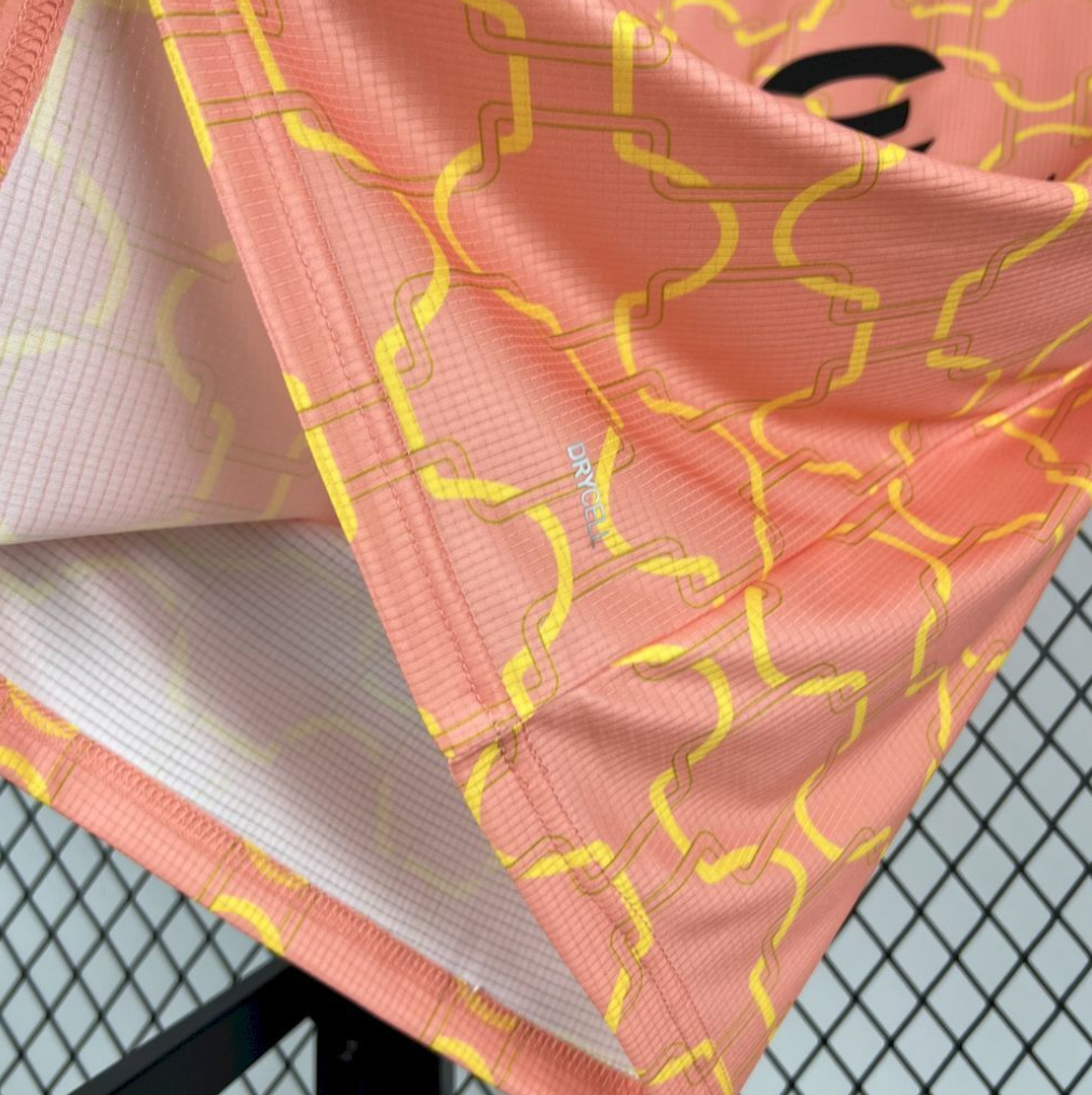bottom left view of the AC Milan 2025/26 Pre-Match Jersey in Light Orange