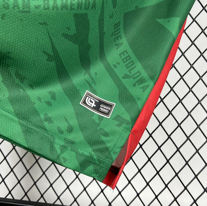 bottom left view of the Cameroon 25/26 Home Green Football Short Sleeve Jersey Designed by Fourteen