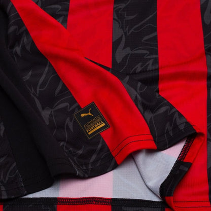 bottom left view of the PUMA AC Milan 2025/26 Home Long Sleeve Black & Red Jersey