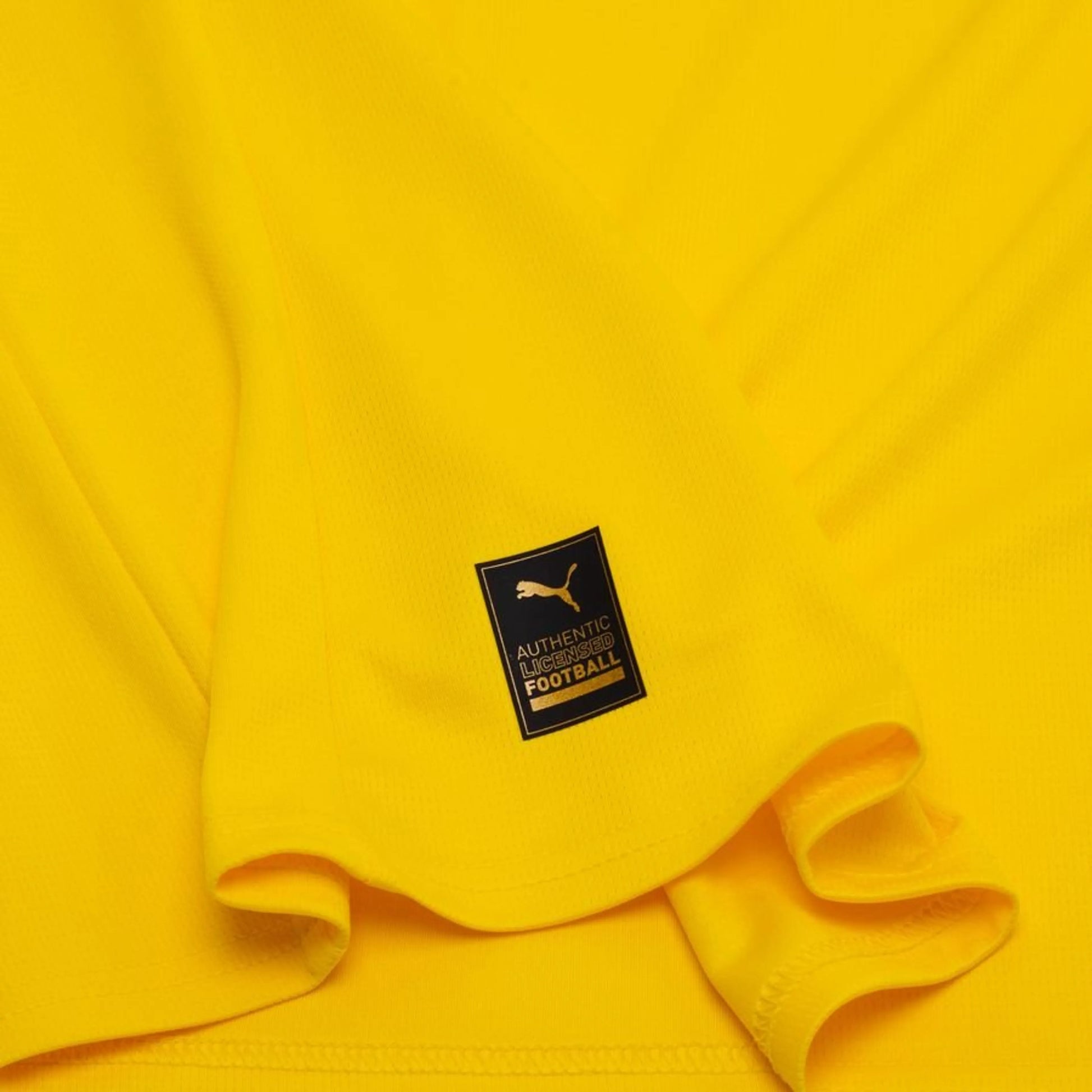bottom left view of the PUMA Borussia Dortmund 2025/26 Home Yellow Shirt