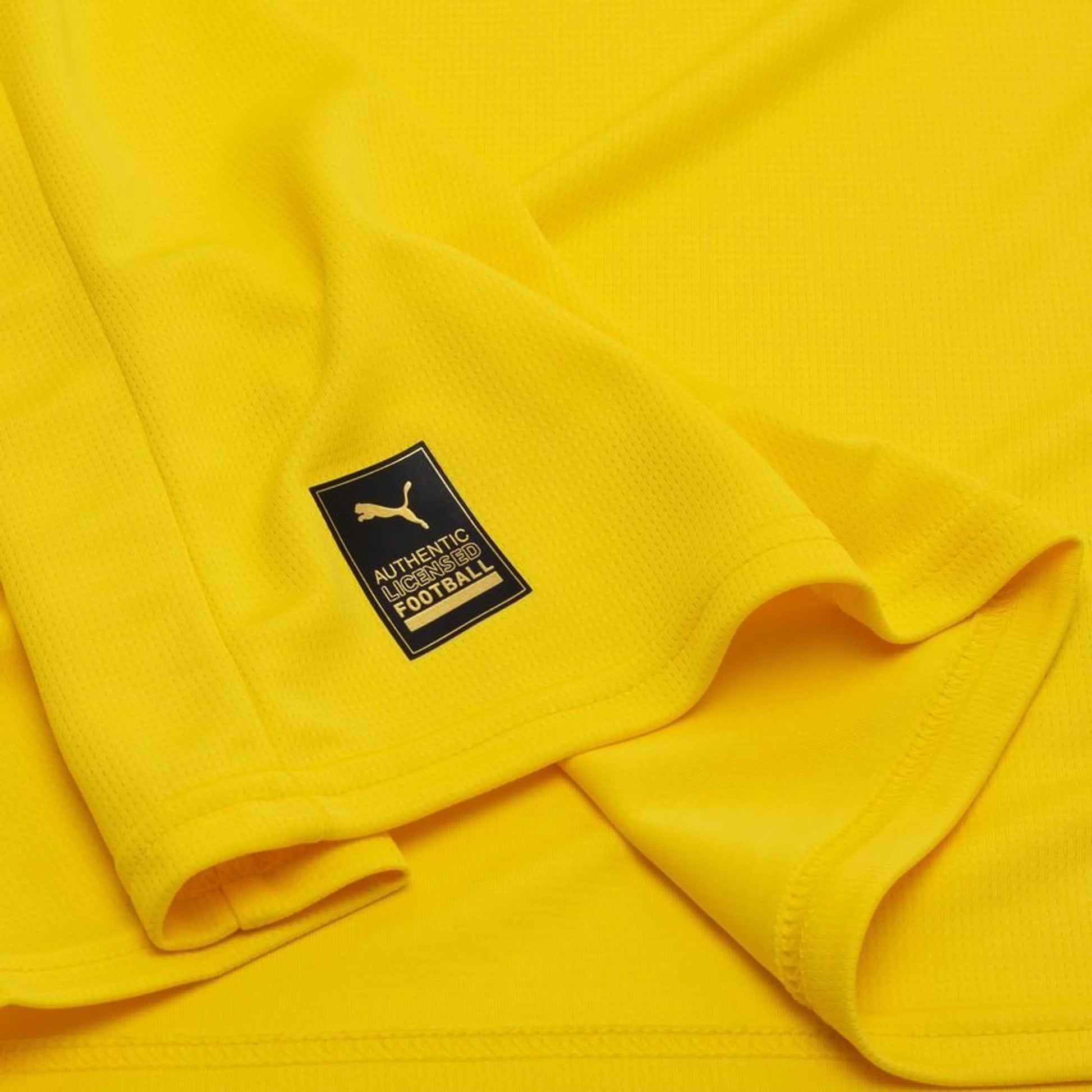 bottom left view of the PUMA Girona FC 2025/26 Away Yellow Shirt
