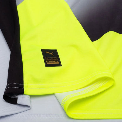 bottom left view on the PUMA Borussia Dortmund 2025/26 Away Shirt in Black and Yellow