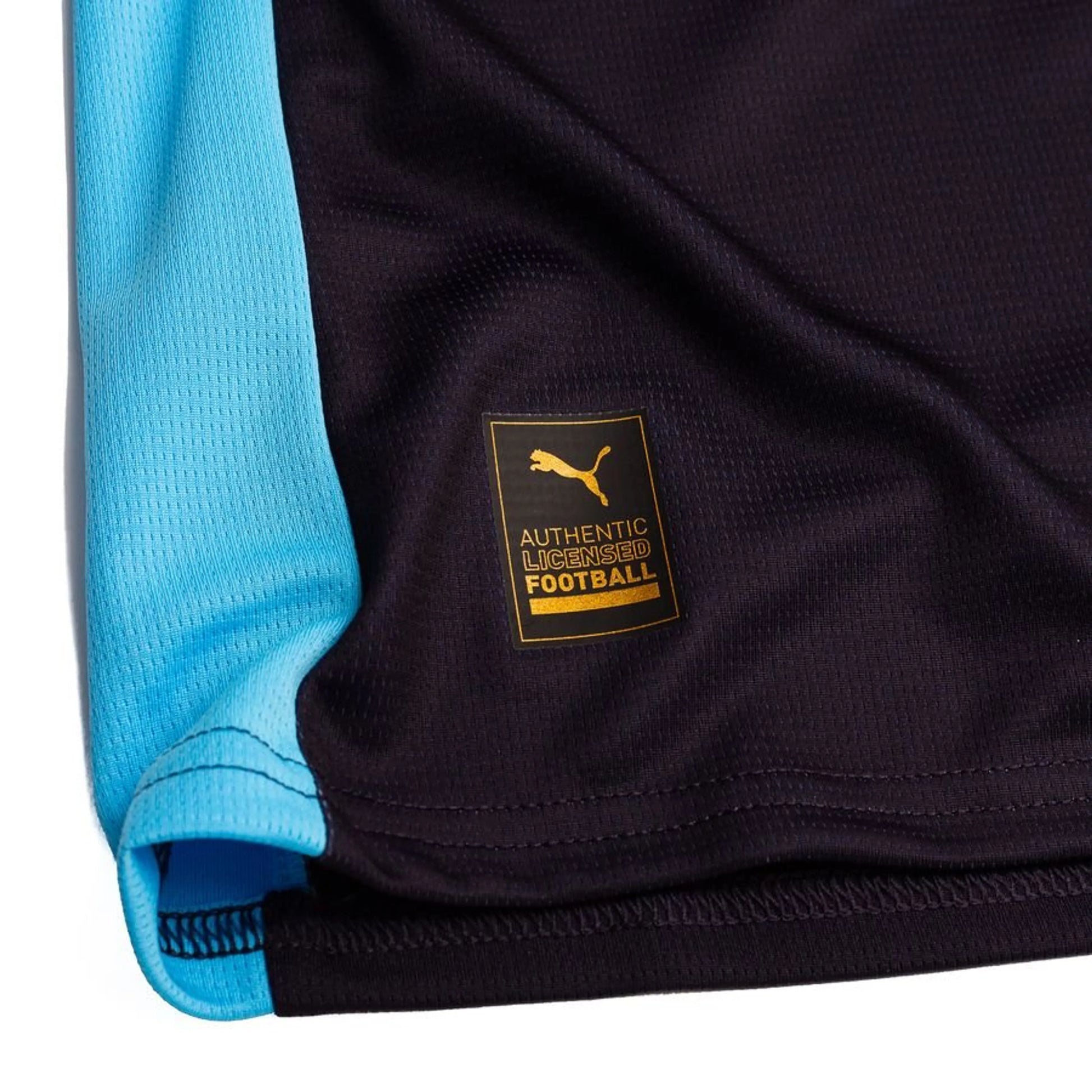 bottom right of the Marseille 2025/26 Away Shirt Long Sleeve Navy/Blue