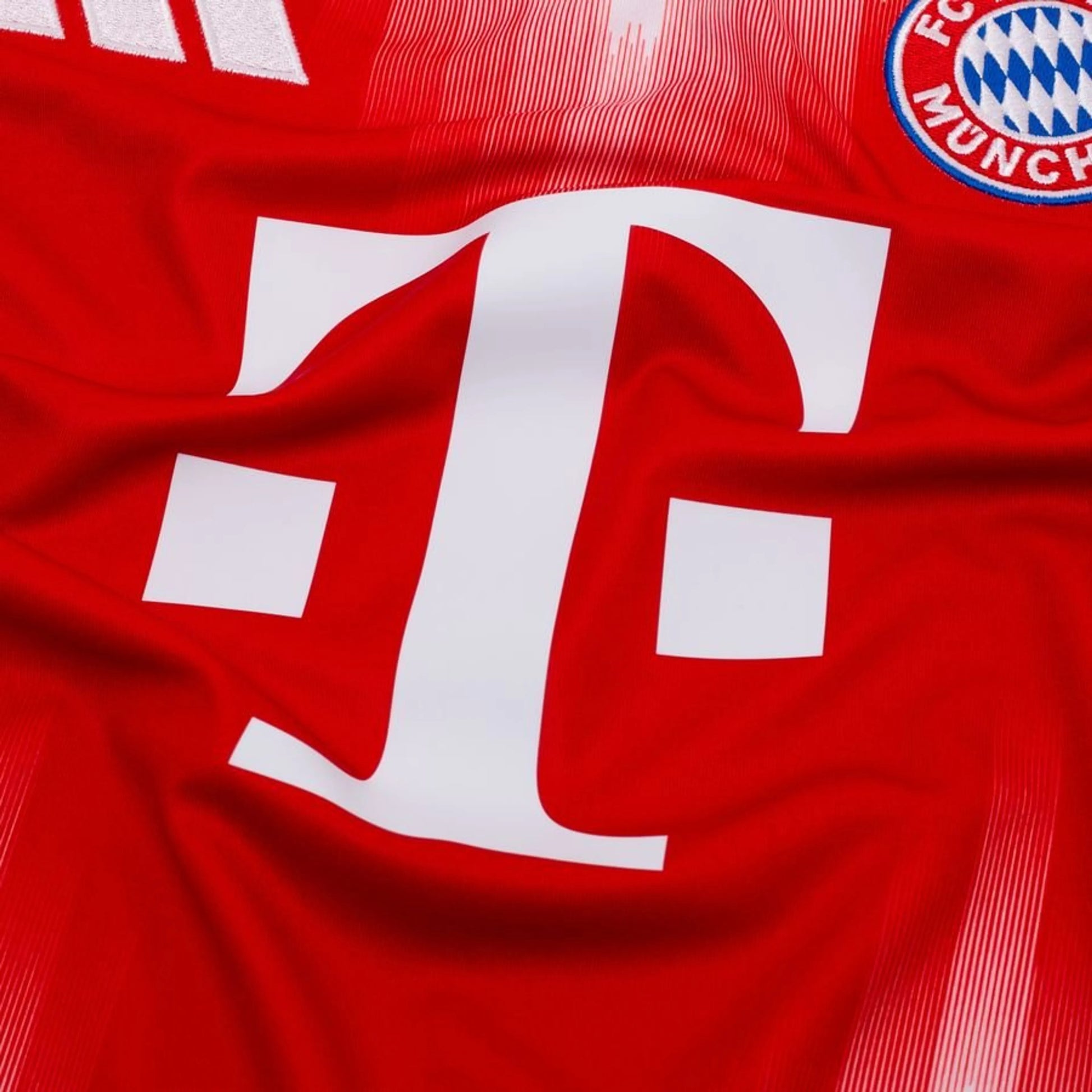 close up view on the Adidas Bayern Munchen 2025/26 Home Red & White Jersey
