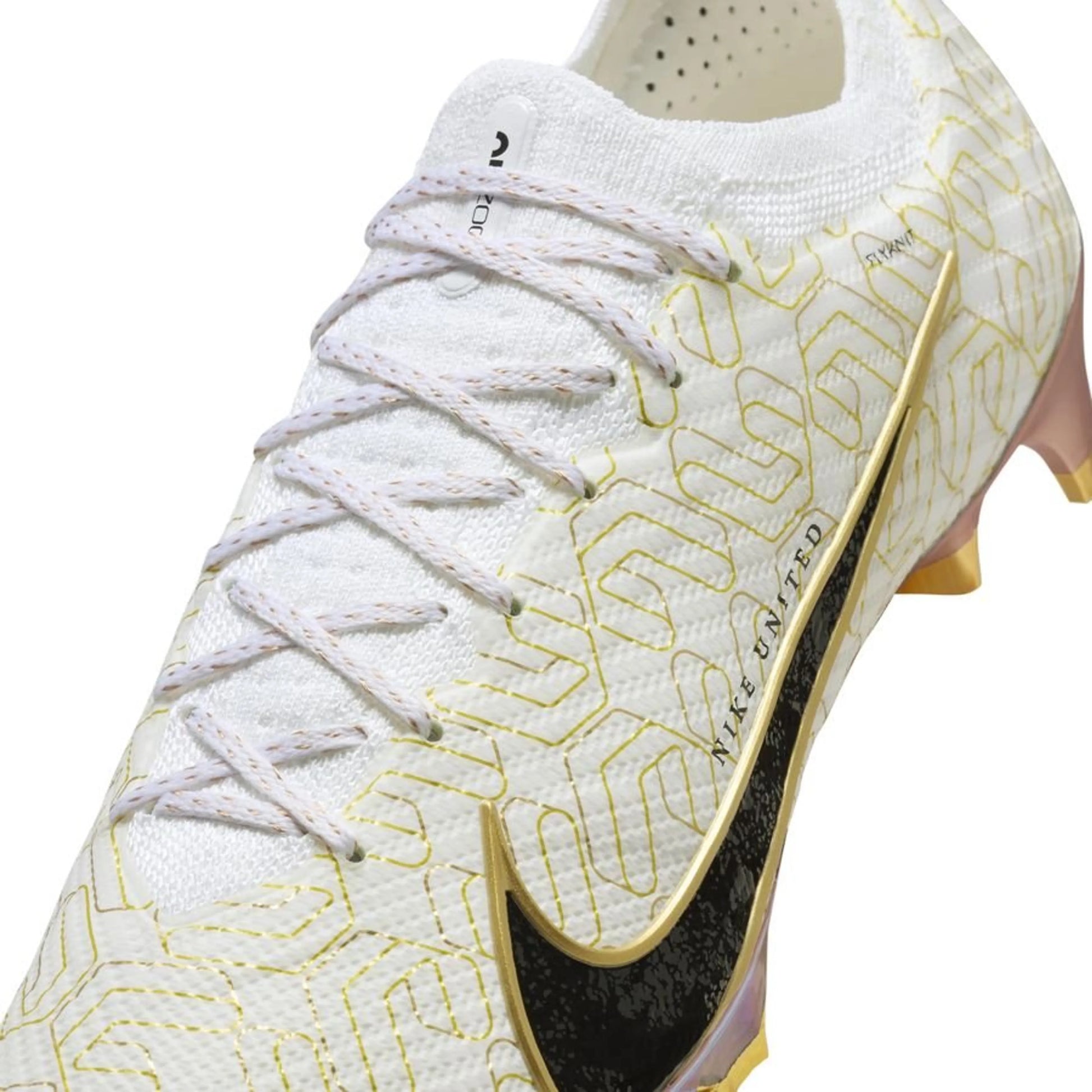 close up view of the Nike Air Zoom Mercurial Vapor 15 Elite FG "United Golden" pack in a White/Black/Gold colorway
