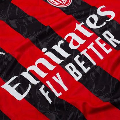 close up view of the PUMA AC Milan 2025/26 Home Long Sleeve Black & Red Jersey