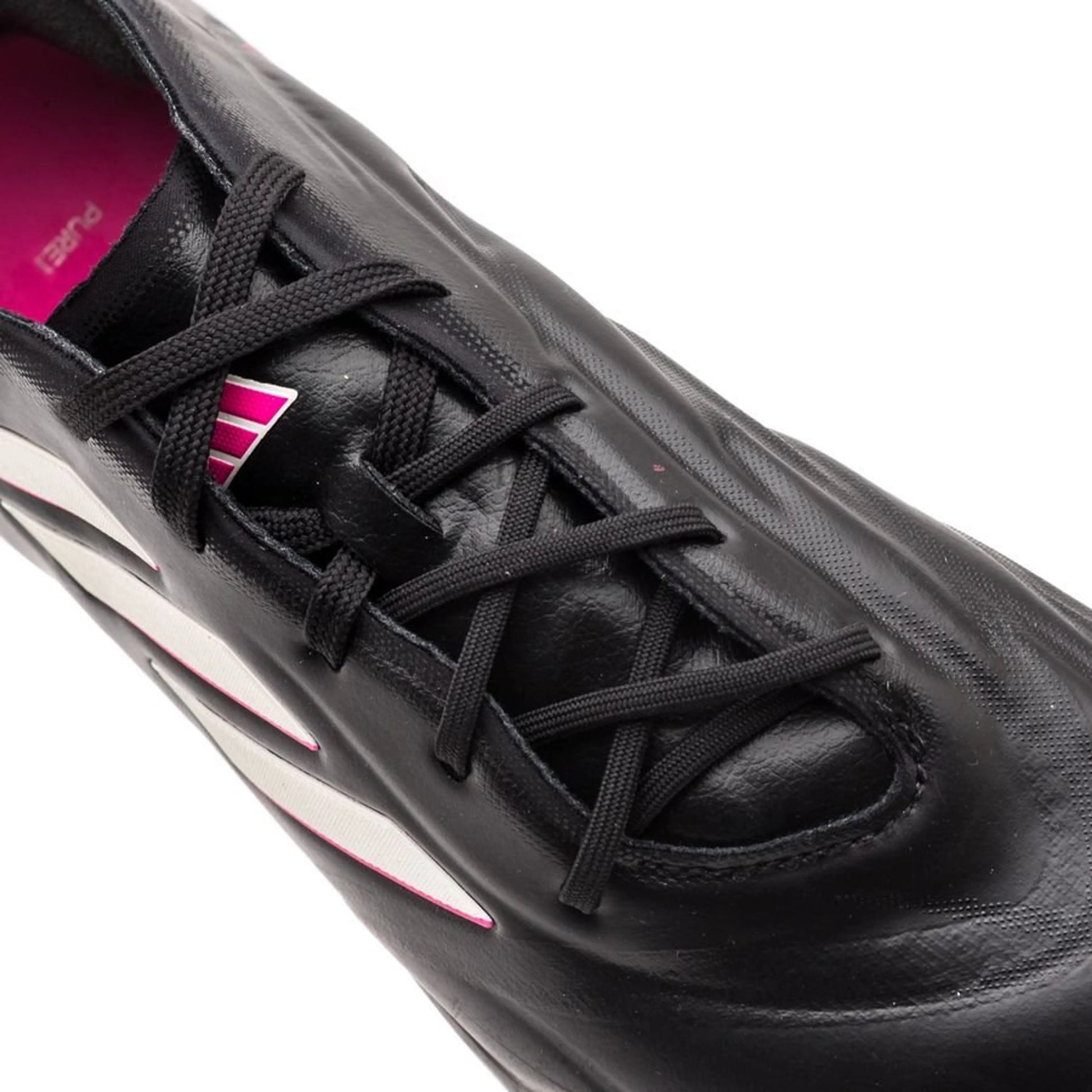 close up view of the adidas Copa Pure .1 FG "Own Your Football" Pack in a Black/White/Pink colorway