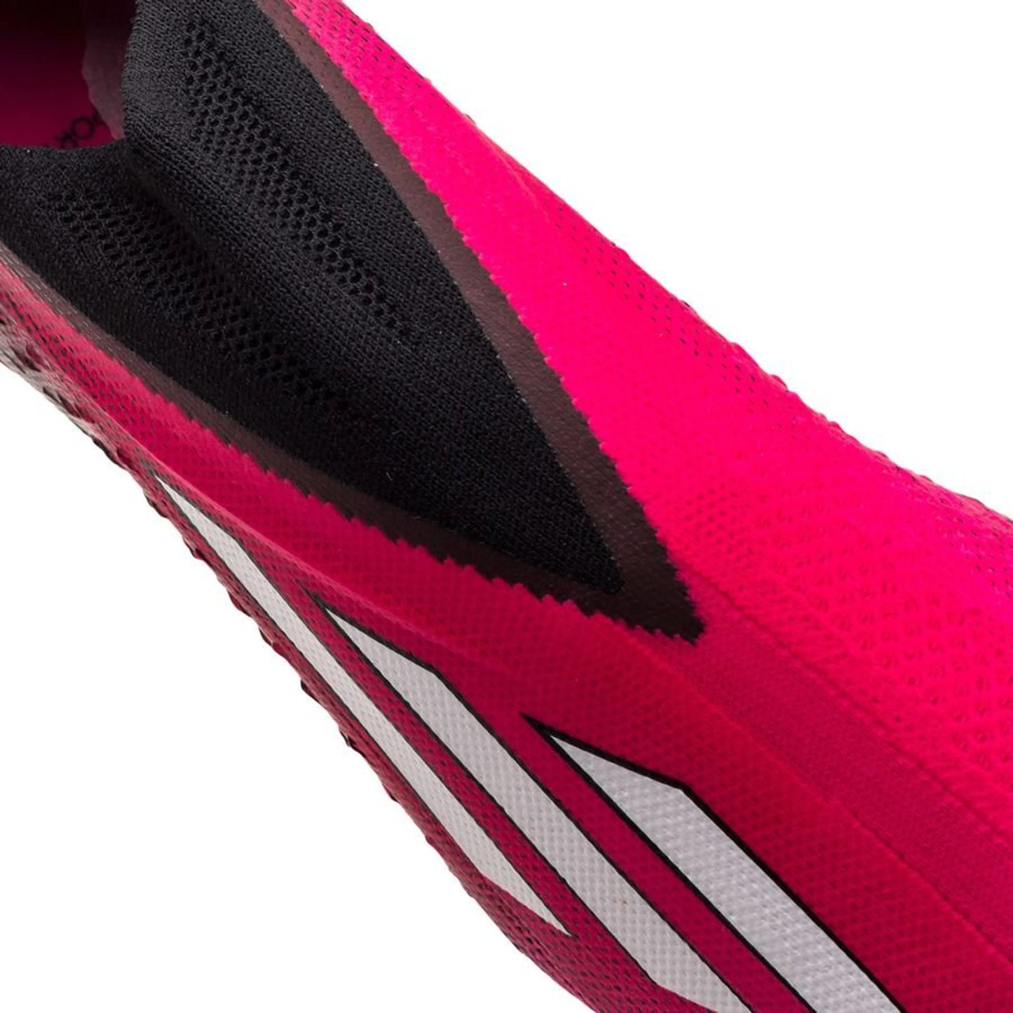 close up view of the adidas X Speedportal+ FG "Own Your Football" Pack in a Pink/Black colorway