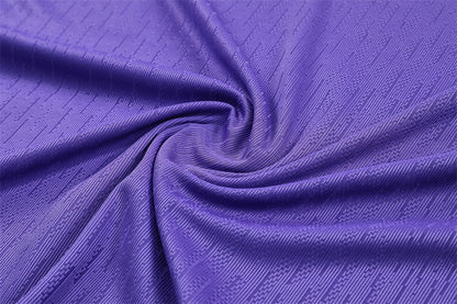 close up view of the Atletico Madrid 25/26 Quarter-Zip Tracksuit Purple/Pink/Navy colorway