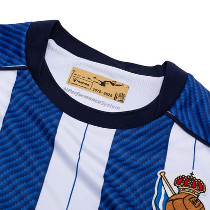 neck view of the Macron Real Sociedad 2025/26 Home Blue and White Shirt