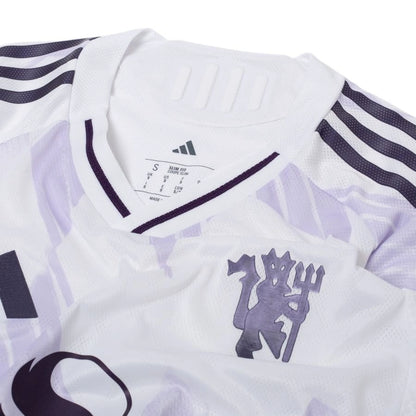 neck view of the adidas Manchester United 2025/26 Away White Jersey