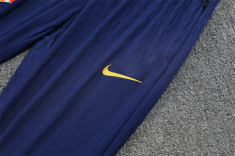 nike logo on the pants of Atletico Madrid 25/26 Quarter-Zip Tracksuit Purple/Pink/Navy colorway