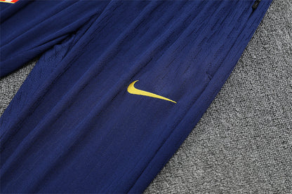 nike logo on the pants of Atletico Madrid 25/26 Quarter-Zip Tracksuit Purple/Pink/Navy colorway