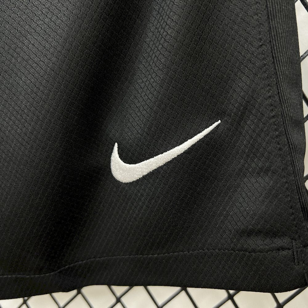 nike logo view on the Chelsea 25/26 Third Black Shorts